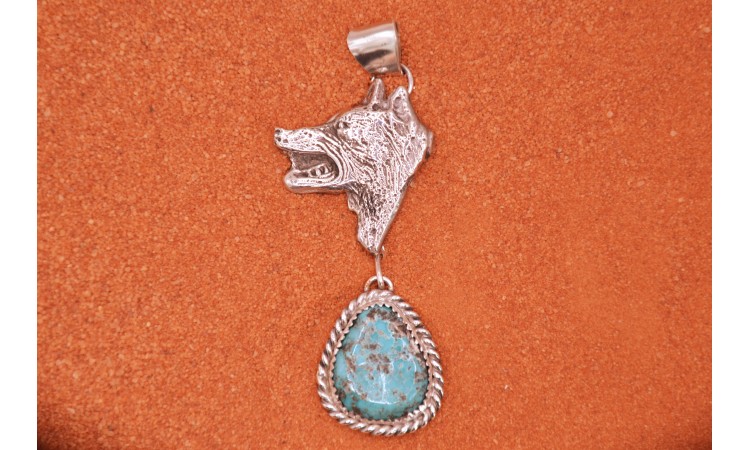 Wolf and turquoise pendant