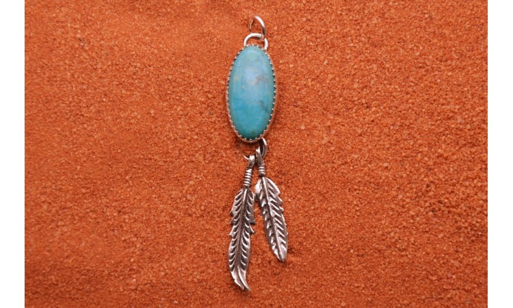 Turquoise and feather pendant