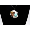 Pendentif turquoise et griffe de loup