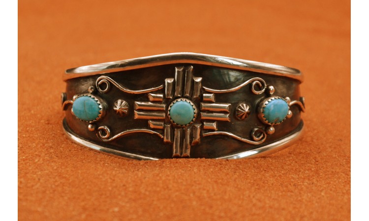 Zia cross and turquoise bracelet